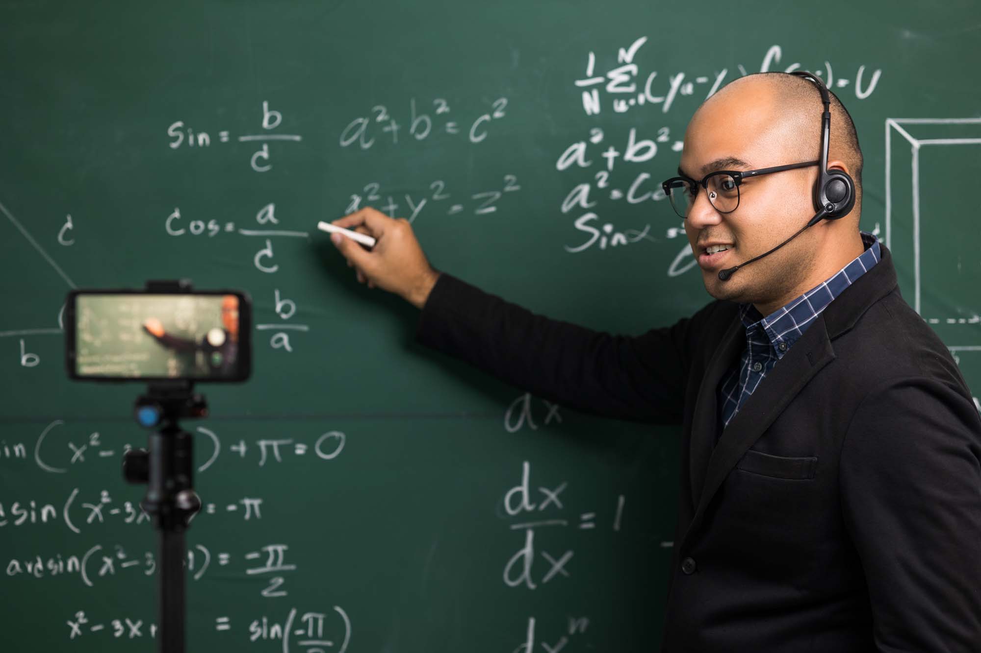 Indian,Young,Teacher,Man,Wearing,Headset,Teaching,Online,Video,Conference